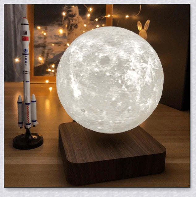 Lunamen - Magnetic Levitating Moon Lamp that rotates and levitates above a magnetic base, displaying the moon's detailed surface.