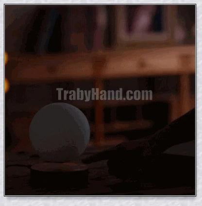 Lunamen - Magnetic Levitating Moon Lamp that rotates and levitates above a magnetic base, displaying the moon's detailed surface.