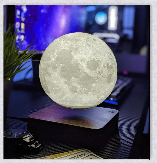Lunamen - Magnetic Levitating Moon Lamp that rotates and levitates above a magnetic base, displaying the moon's detailed surface.