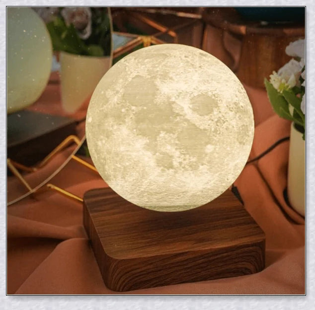 Lunamen - Magnetic Levitating Moon Lamp that rotates and levitates above a magnetic base, displaying the moon's detailed surface.