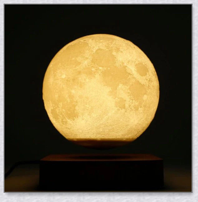 Lunamen - Magnetic Levitating Moon Lamp that rotates and levitates above a magnetic base, displaying the moon's detailed surface.
