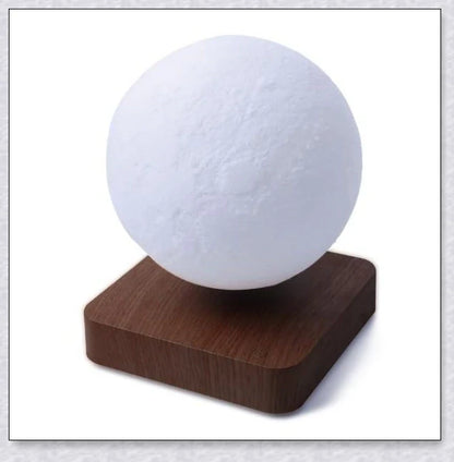 Lunamen - Magnetic Levitating Moon Lamp that rotates and levitates above a magnetic base, displaying the moon's detailed surface.