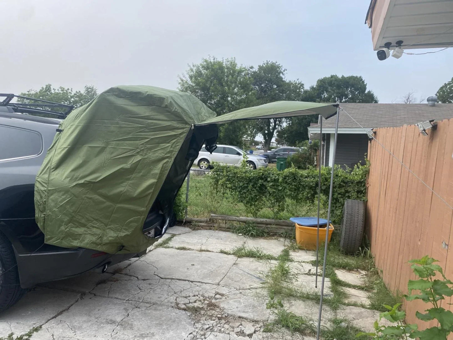 Car Trunk Extension Tent made from durable 210D polyester Oxford fabric with a 2000PU waterproof rating and UV-resistant coating, providing a comfortable and versatile shelter for outdoor adventures.