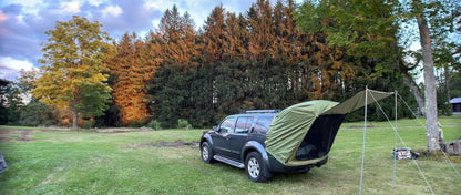 Car Trunk Extension Tent made from durable 210D polyester Oxford fabric with a 2000PU waterproof rating and UV-resistant coating, providing a comfortable and versatile shelter for outdoor adventures.