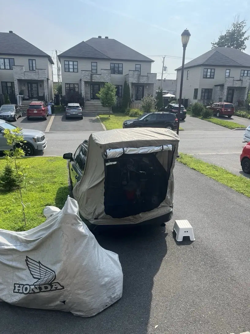 Car Trunk Extension Tent made from durable 210D polyester Oxford fabric with a 2000PU waterproof rating and UV-resistant coating, providing a comfortable and versatile shelter for outdoor adventures.