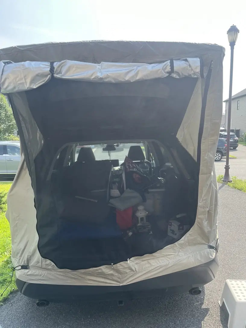 Car Trunk Extension Tent made from durable 210D polyester Oxford fabric with a 2000PU waterproof rating and UV-resistant coating, providing a comfortable and versatile shelter for outdoor adventures.