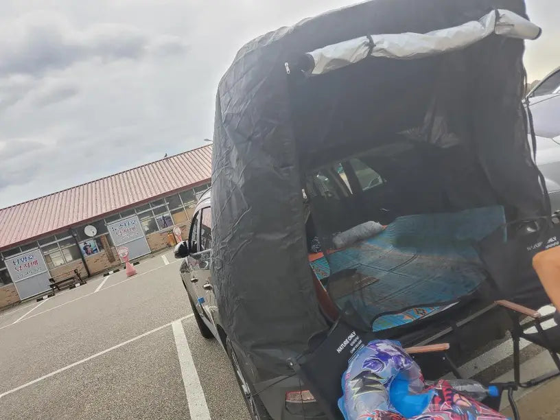 Car Trunk Extension Tent made from durable 210D polyester Oxford fabric with a 2000PU waterproof rating and UV-resistant coating, providing a comfortable and versatile shelter for outdoor adventures.