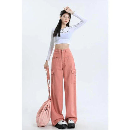 Women wearing pink high waist baggy jeans with straight leg design and vintage style