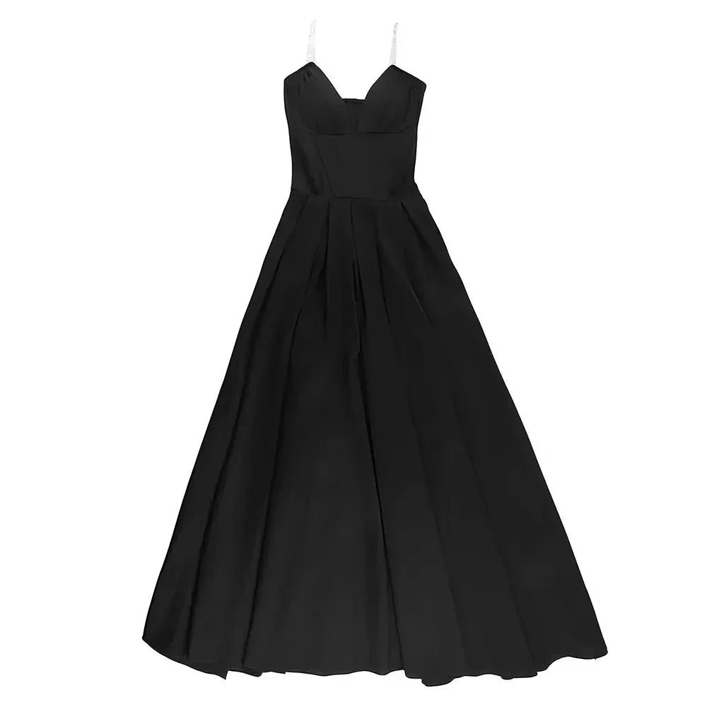 Elegant black maxi dress with spaghetti straps and backless design, perfect for formal occasions and turning heads