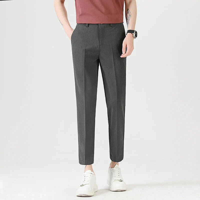 Light Luxury Men's Casual Small Trousers in various colors and sizes, featuring a stretch pencil pant design for a sleek, flattering look.