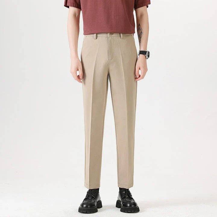 Light Luxury Men's Casual Small Trousers in various colors and sizes, featuring a stretch pencil pant design for a sleek, flattering look.