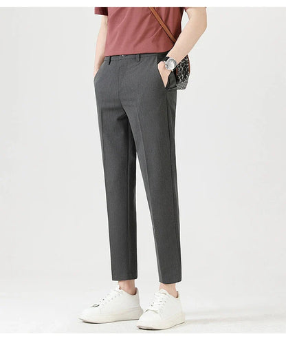 Light Luxury Men's Casual Small Trousers in various colors and sizes, featuring a stretch pencil pant design for a sleek, flattering look.