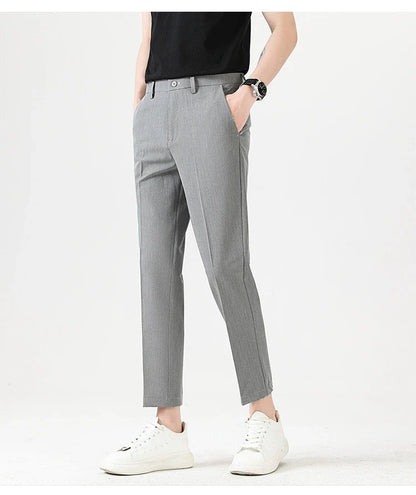 Light Luxury Men's Casual Small Trousers in various colors and sizes, featuring a stretch pencil pant design for a sleek, flattering look.