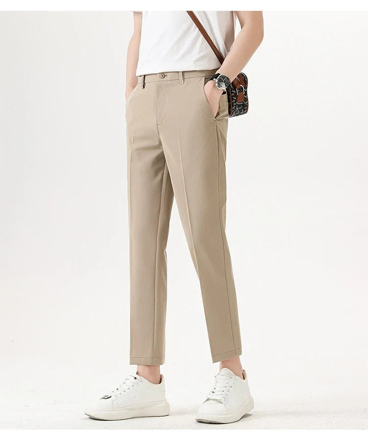 Light Luxury Men's Casual Small Trousers in various colors and sizes, featuring a stretch pencil pant design for a sleek, flattering look.