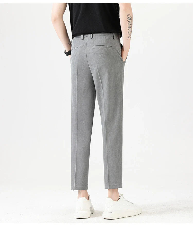 Light Luxury Men's Casual Small Trousers in various colors and sizes, featuring a stretch pencil pant design for a sleek, flattering look.