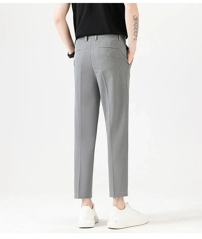Light Luxury Men's Casual Small Trousers in various colors and sizes, featuring a stretch pencil pant design for a sleek, flattering look.