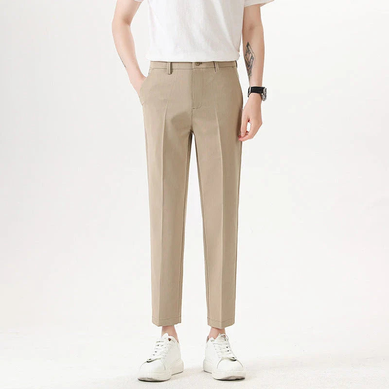 Light Luxury Men's Casual Small Trousers in various colors and sizes, featuring a stretch pencil pant design for a sleek, flattering look.