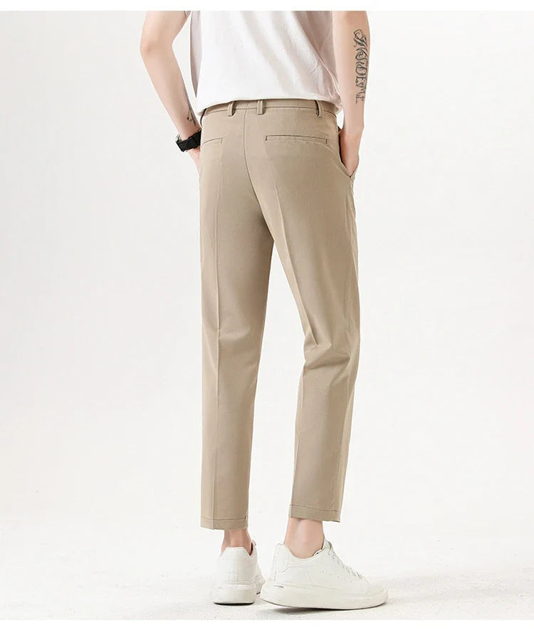 Light Luxury Men's Casual Small Trousers in various colors and sizes, featuring a stretch pencil pant design for a sleek, flattering look.