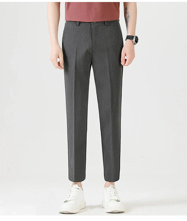 Light Luxury Men's Casual Small Trousers in various colors and sizes, featuring a stretch pencil pant design for a sleek, flattering look.