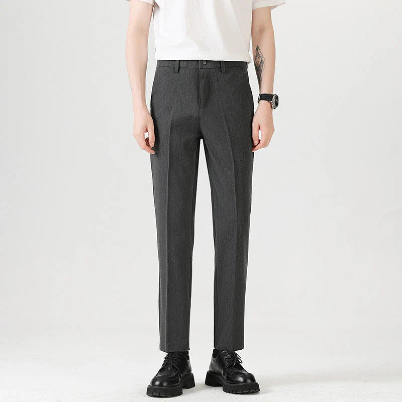 Light Luxury Men's Casual Small Trousers in various colors and sizes, featuring a stretch pencil pant design for a sleek, flattering look.