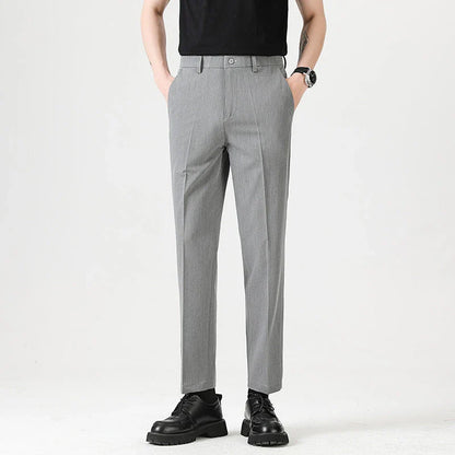 Light Luxury Men's Casual Small Trousers in various colors and sizes, featuring a stretch pencil pant design for a sleek, flattering look.