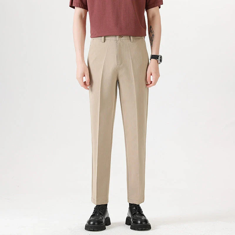 Light Luxury Men's Casual Small Trousers in various colors and sizes, featuring a stretch pencil pant design for a sleek, flattering look.