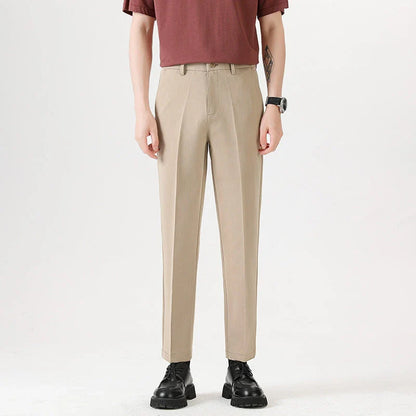 Light Luxury Men's Casual Small Trousers in various colors and sizes, featuring a stretch pencil pant design for a sleek, flattering look.