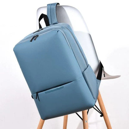Business Laptop Bag Outdoor Fashion Millet Large-Capacity Backpack in Light Gray, Black, Dark Blue, and Sky Blue colors