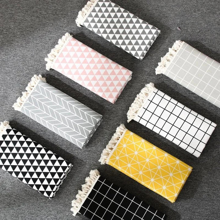 A Nordic-inspired cotton tablecloth with a minimalist design, adding a touch of Scandinavian elegance to any dining space.