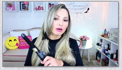 Professional Rotating Curling Iron with auto-rotating barrel, titanium plates, and tourmaline ceramic coating for effortless salon-quality hairstyles.