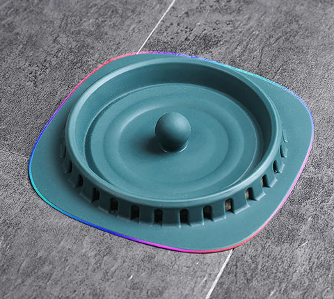 A durable and flexible floor drain cover that effectively seals in odors and allows for quick drainage.