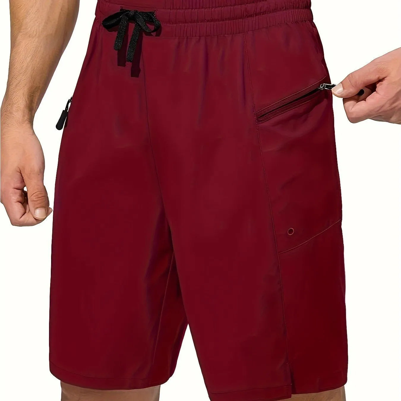 Men's solid-colour quick-drying beach shorts in a straight-leg style on a neutral background.