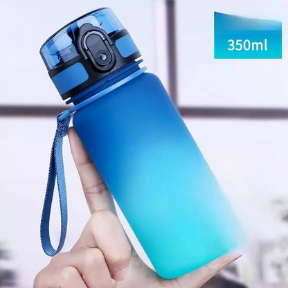 Large capacity Tritan sports water bottle in vibrant colors, perfect for hydration on the go