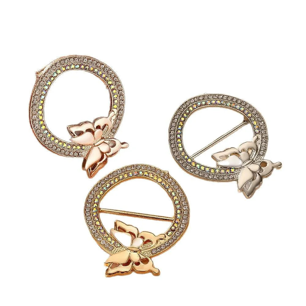 Bow-shaped waist-cinching accessory clip for high-end brooches, alloy with electroplating and diamond inlay, shown in gold, silver, or rose gold finishes.