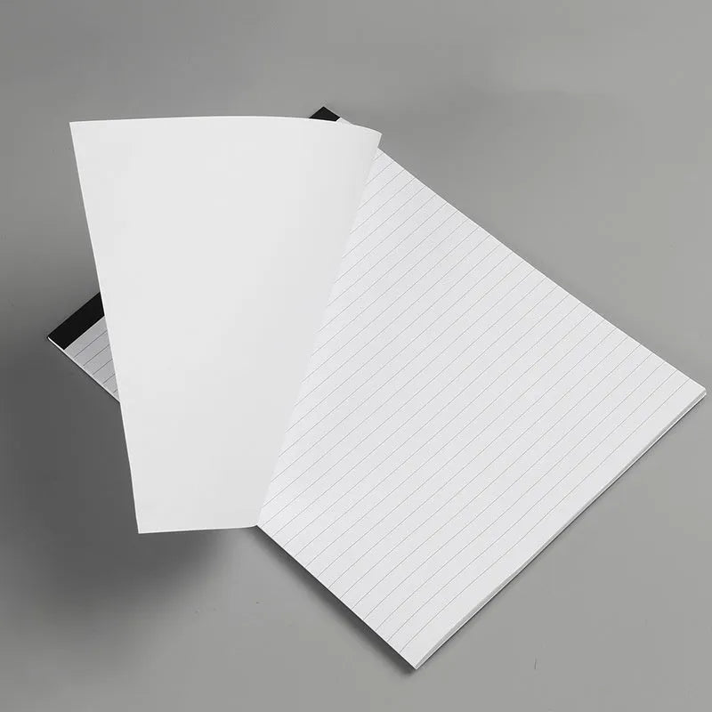 A4 tearable notebook with grid-lined pages and wireless adhesive binding for clean page removal