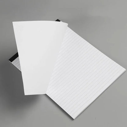 A4 tearable notebook with grid-lined pages and wireless adhesive binding for clean page removal