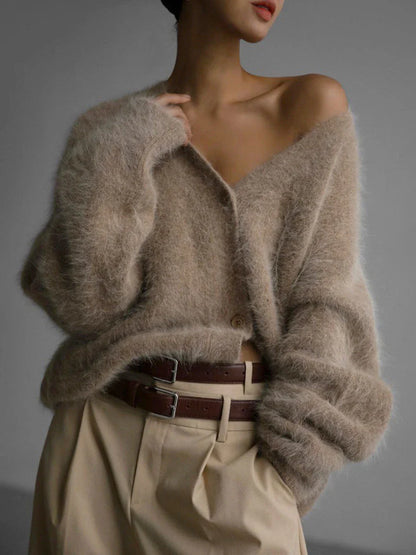 Cozy oversized cardigan with v-neck, button front, and variety of color options for women