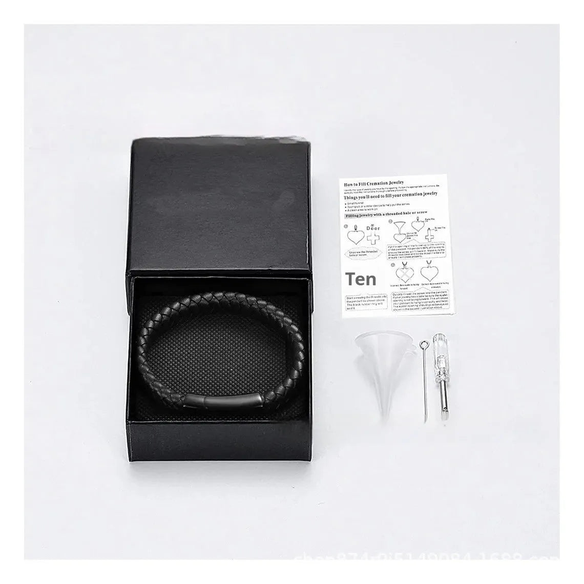 Black leather and stainless steel men's casket bracelet with engraved letters in a woven design.