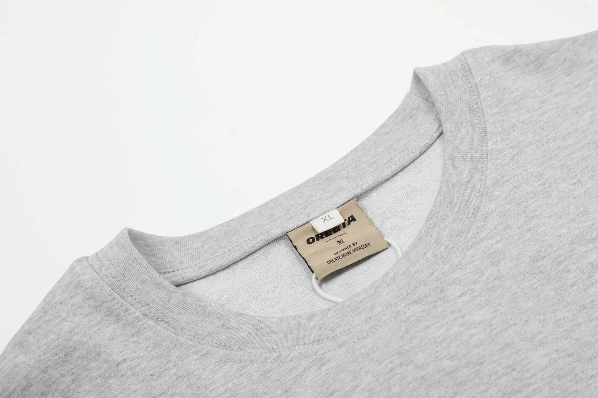 Cotton long sleeve t-shirt in loose fit design shown in black and flower grey colour options
