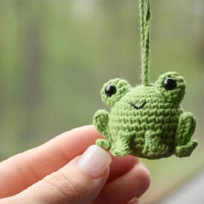 Handmade woven frog car pendant in plush material measuring 5cm wide