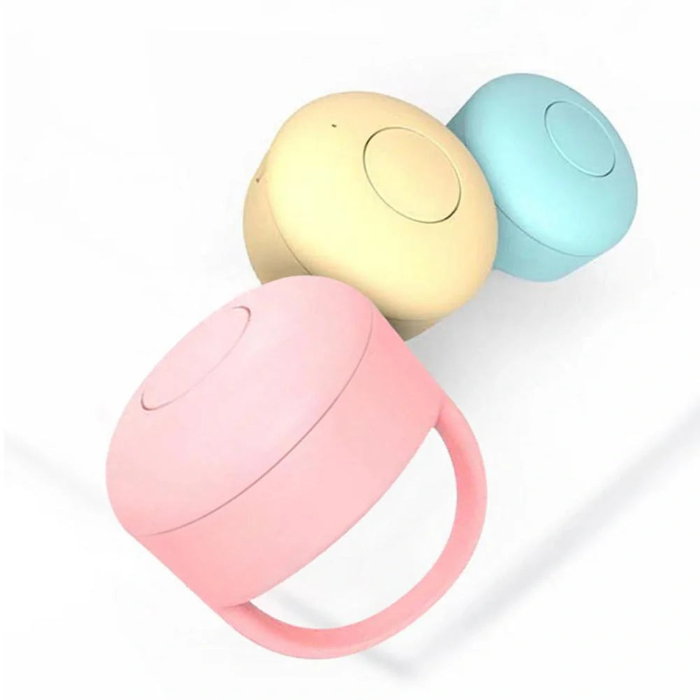Bluetooth Remote Control Ring for mobile phones in yellow, blue, and pink colors