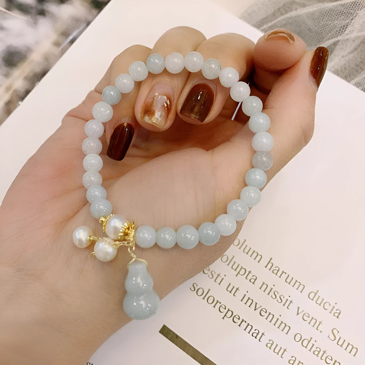 Natural emerald jade bracelet with traditional Chinese gourd design elements for women