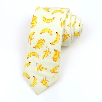 A narrow Korean-style cotton bow tie featuring a cartoon print, shown in a selection of colours.
