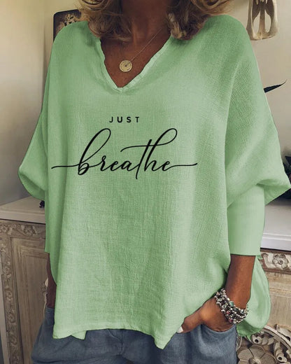 Women's loose-fit V-neck long sleeve top in brushed milk silk fabric for summer casual wear.