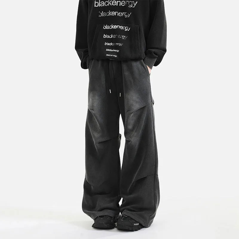 Men's cotton straight-leg sweatpants in black and gray with pleated washed finish and elastic waist