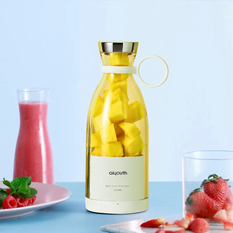 Pink and white handheld USB-charged mini juicer with automatic cleaning function
