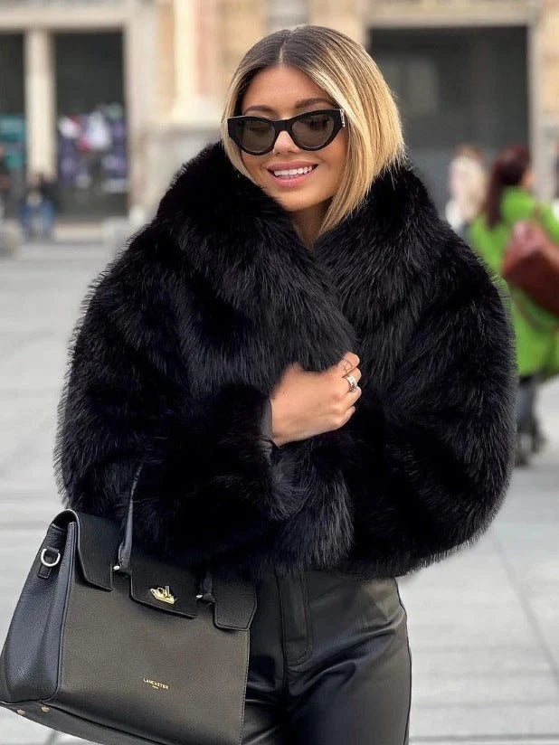 A warm and stylish plush coat for women, available in a variety of colors and sizes.