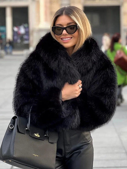 A warm and stylish plush coat for women, available in a variety of colors and sizes.