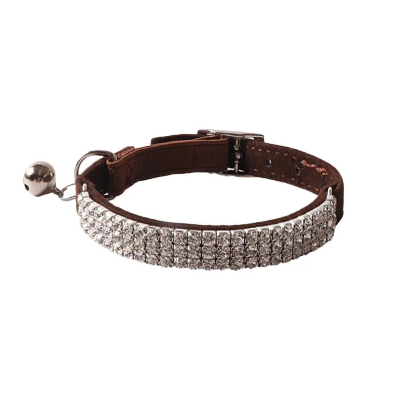 Cat collar with elastic buckle in six colour options showing 28cm length and flocking material texture