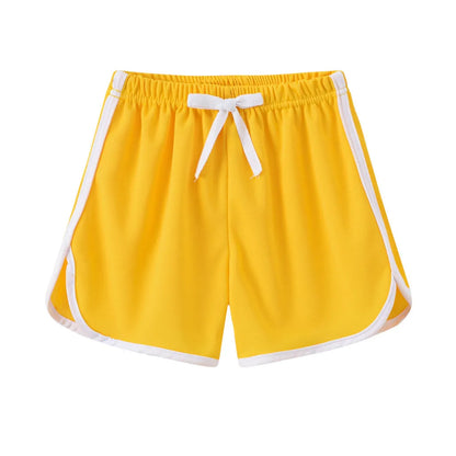 Children's polyester beach shorts in multiple colours and patterns, including leopard print and stripes, shown on size chart.